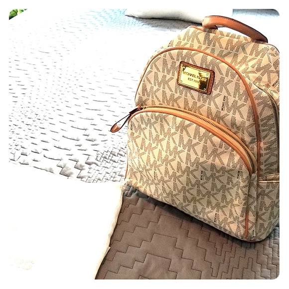 Michael Kors Handbags - Michael Kors Beige Logo Backpack with Tan Trim
